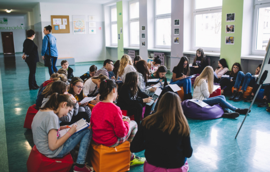 children in a class, reading